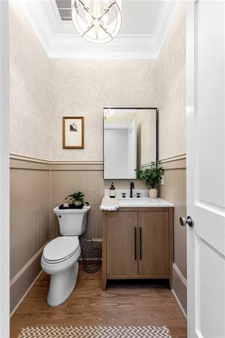 a kitchen with a dining table and chairs