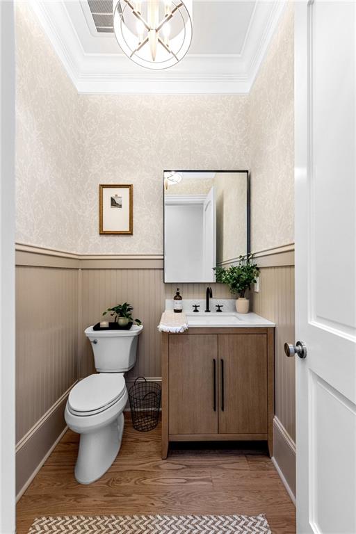 2079 Old Settlement Road Northwest Atlanta, GA 30327 - Photo 37 of 78 a bathroom with a toilet sink and mirror