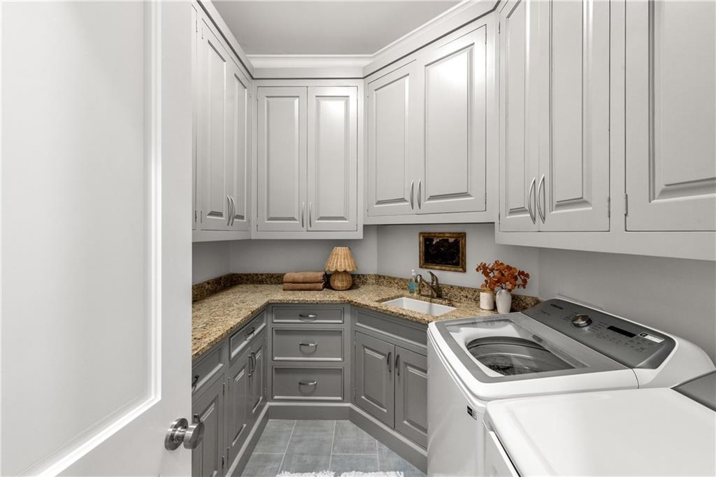 2079 Old Settlement Road Northwest Atlanta, GA 30327 - Photo 38 of 78 a view of a kitchen with sink and cabinets