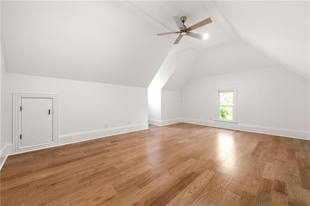 2079 Old Settlement Road Northwest Atlanta, GA 30327 - Photo 44 of 78 wooden floor in an empty room with a window