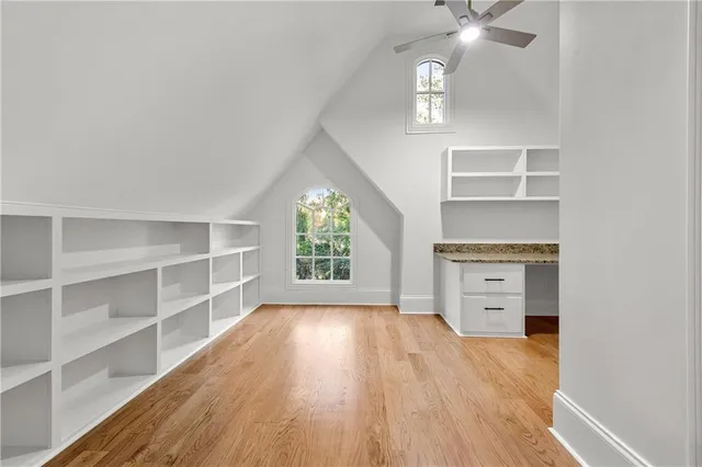 an aerial view of a house with yard swimming pool and outdoor seating