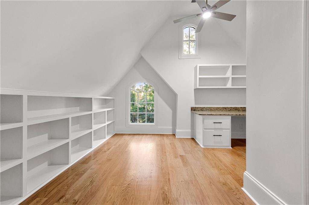 2079 Old Settlement Road Northwest Atlanta, GA 30327 - Photo 48 of 78 wooden floor in an empty room with a window
