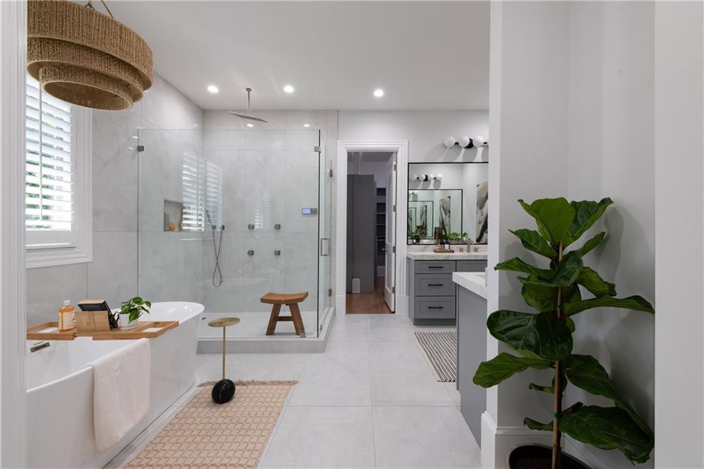 2079 Old Settlement Road Northwest Atlanta, GA 30327 - Photo 5 of 78 a living room with furniture and a potted plant