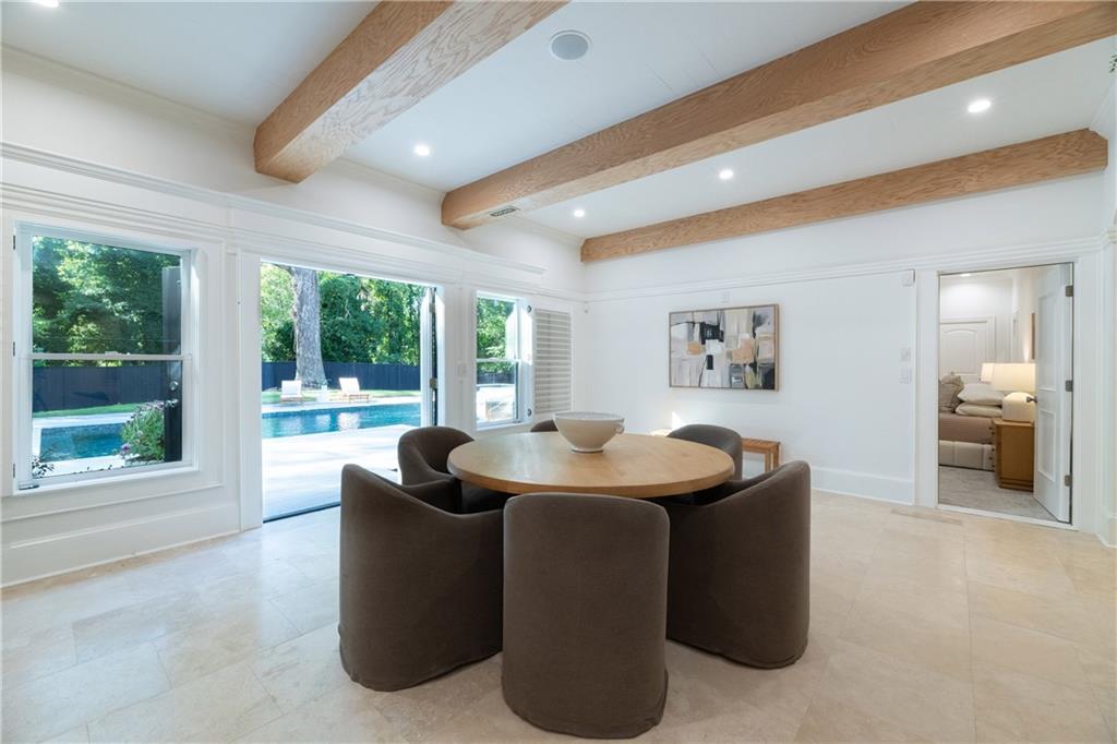 2079 Old Settlement Road Northwest Atlanta, GA 30327 - Photo 66 of 78 a living room with furniture and a large window