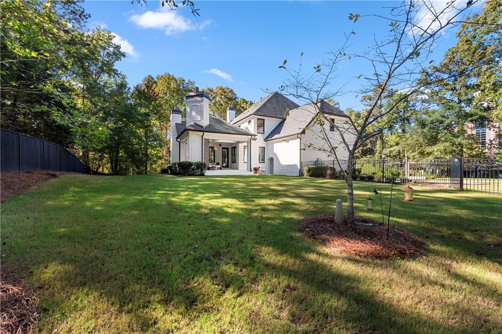 2079 Old Settlement Road Northwest Atlanta, GA 30327 - Photo 72 of 78 a view of a house with a big yard