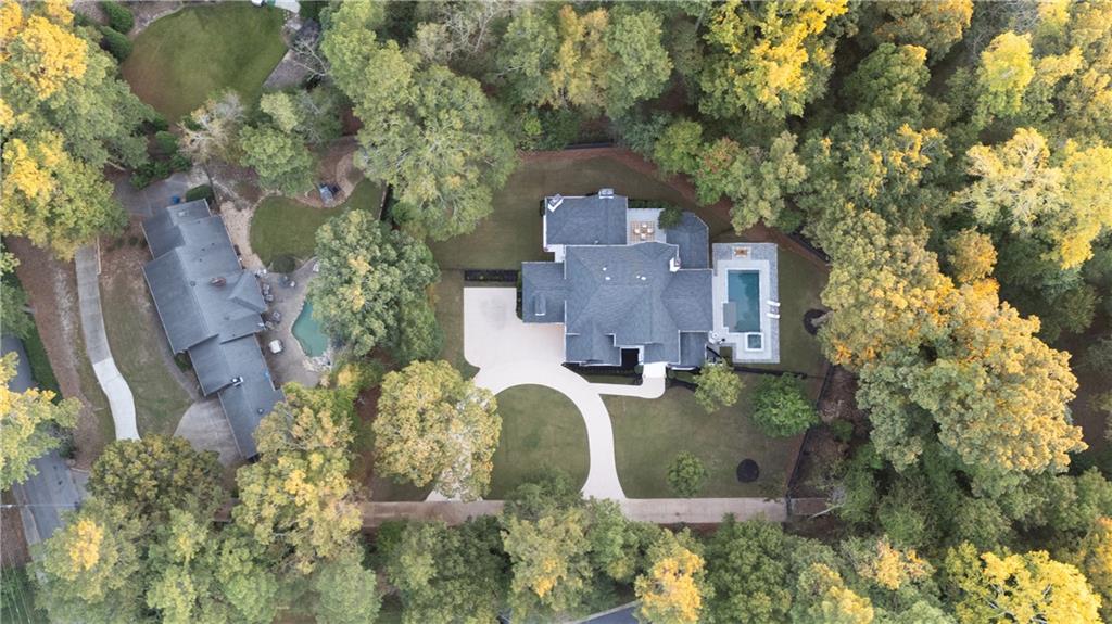 2079 Old Settlement Road Northwest Atlanta, GA 30327 - Photo 73 of 78 an aerial view of a house with yard swimming pool and outdoor seating