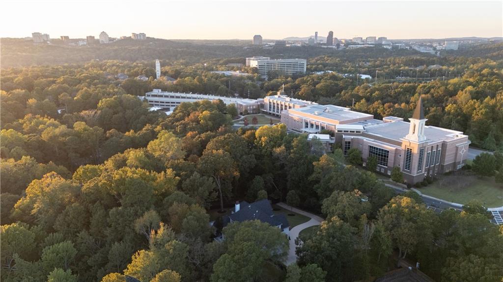 2079 Old Settlement Road Northwest Atlanta, GA 30327 - Photo 75 of 78 an aerial view of house with yard and mountain view in back