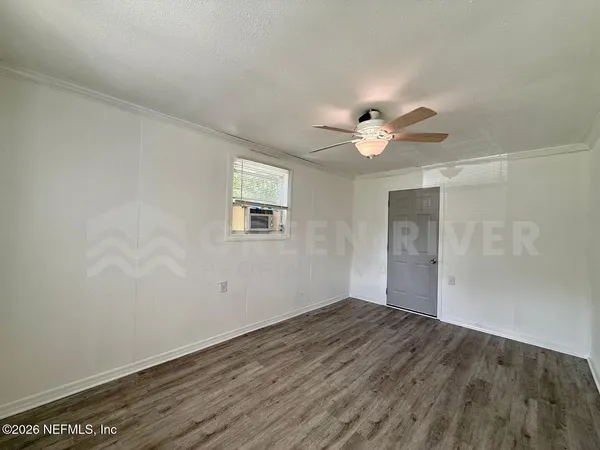 a bathroom with a bathtub shower sink vanity and toilet