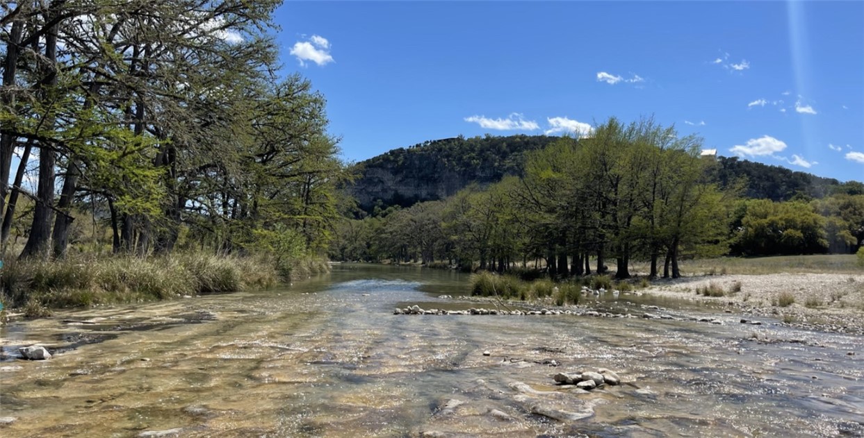 197 Tomahawk Way Concan, TX 78838 - Photo 18 of 18 a view of outdoor space with trees