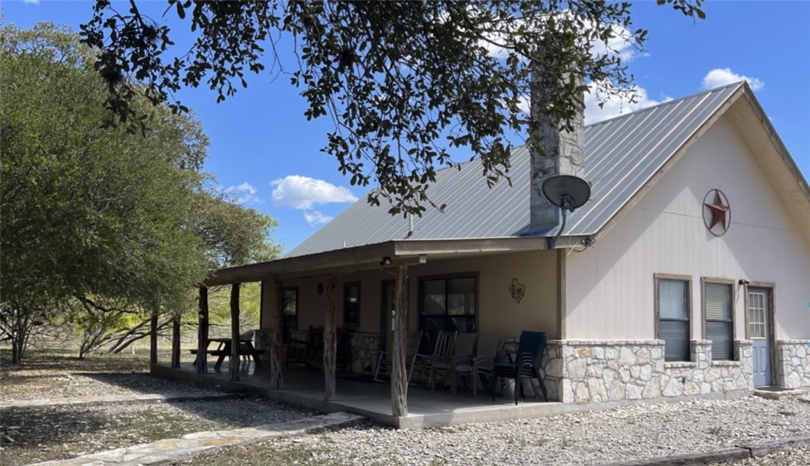 197 Tomahawk Way Concan, TX 78838 - Photo 4 of 18 a view of a house