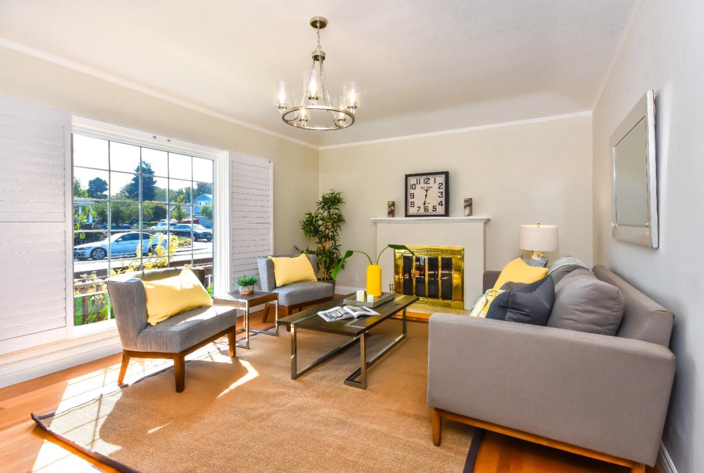 1100 Rosedale Avenue Burlingame, CA 94010 - Photo 3 of 15 a living room with furniture a chandelier and a fireplace