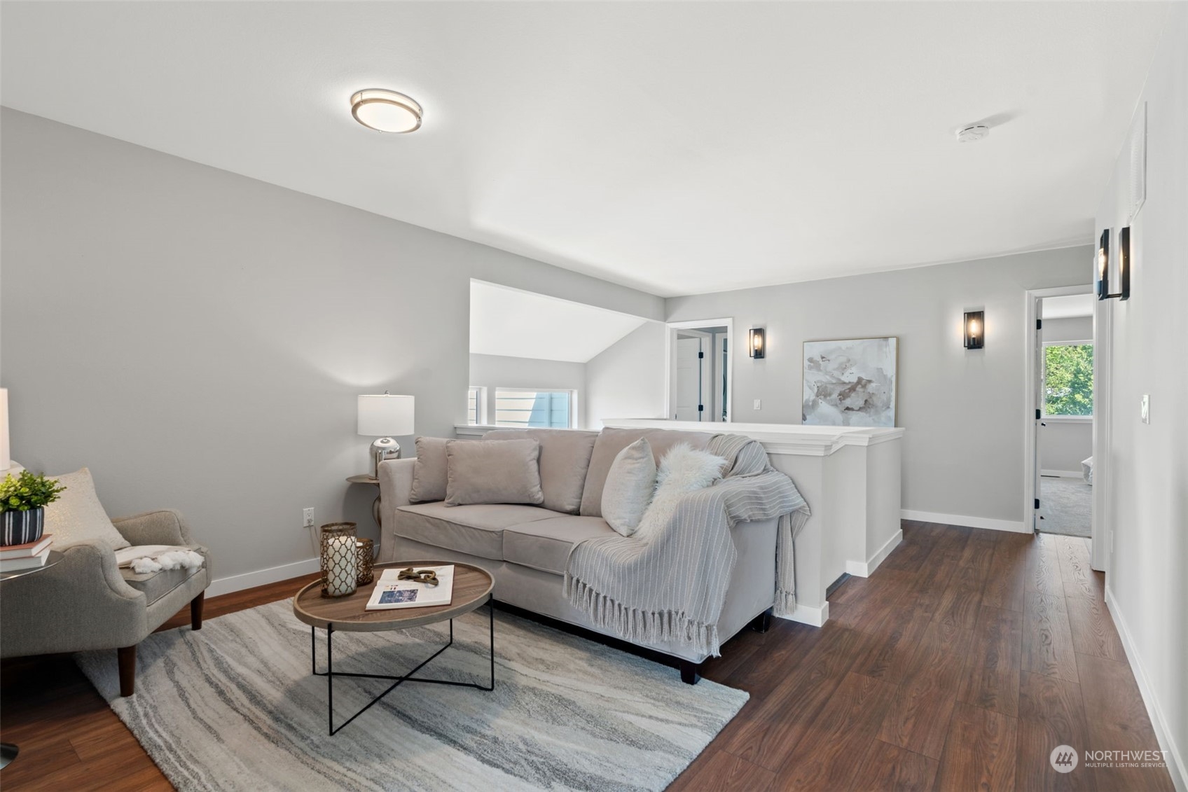 1208 South 35th Street Renton, WA 98055 - Photo 15 of 26 a living room with furniture and wooden floor