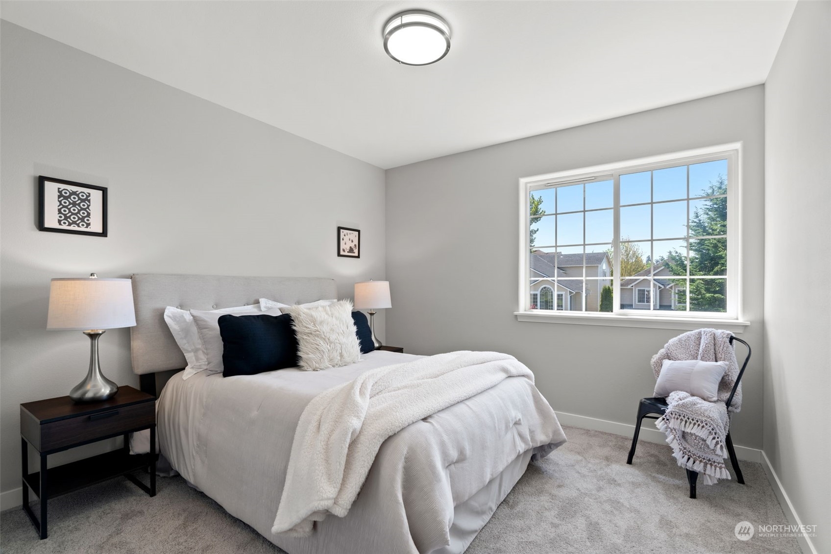 1208 South 35th Street Renton, WA 98055 - Photo 16 of 26 a bedroom with a bed and a window