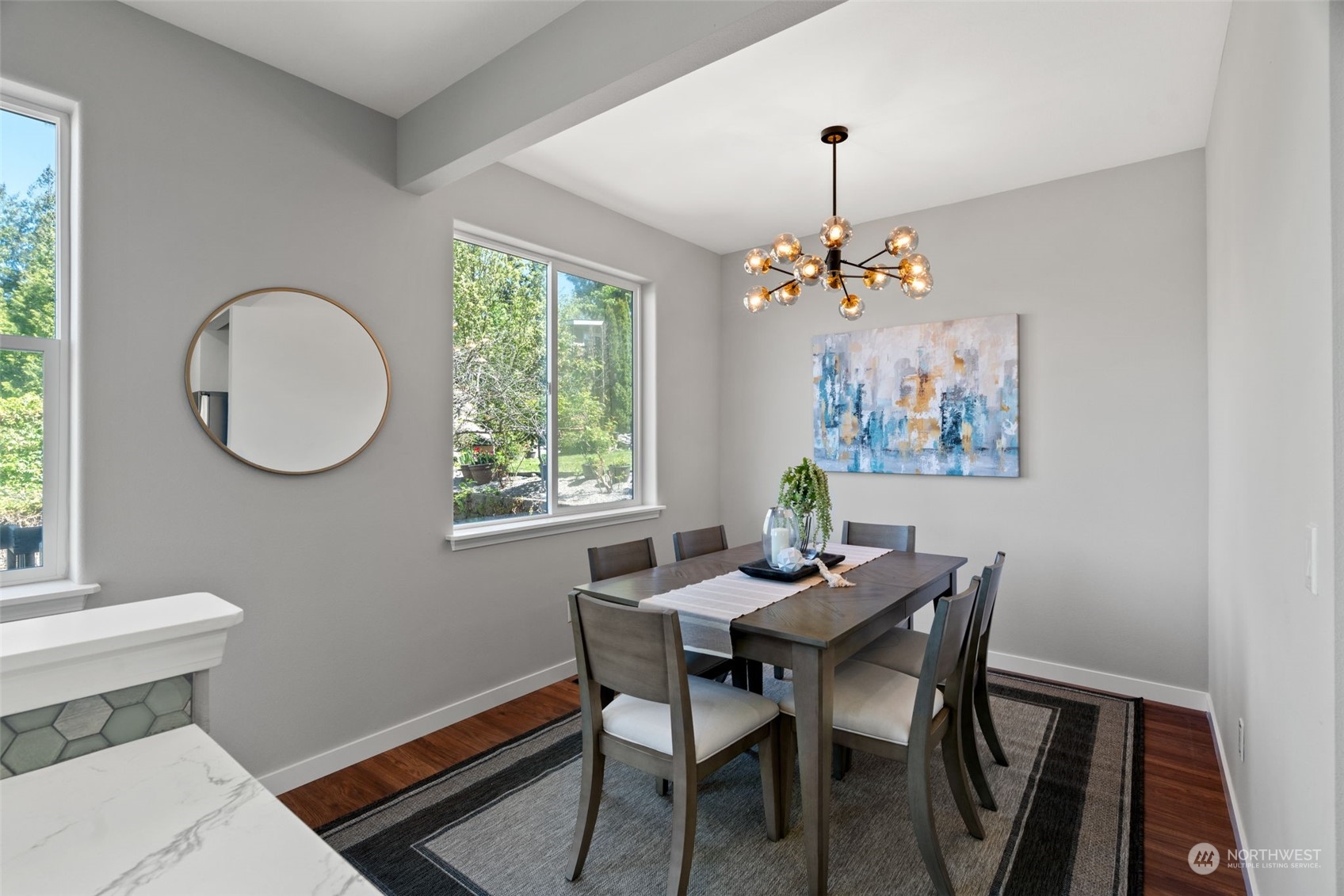 1208 South 35th Street Renton, WA 98055 - Photo 10 of 26 a dining room with chandelier and a window