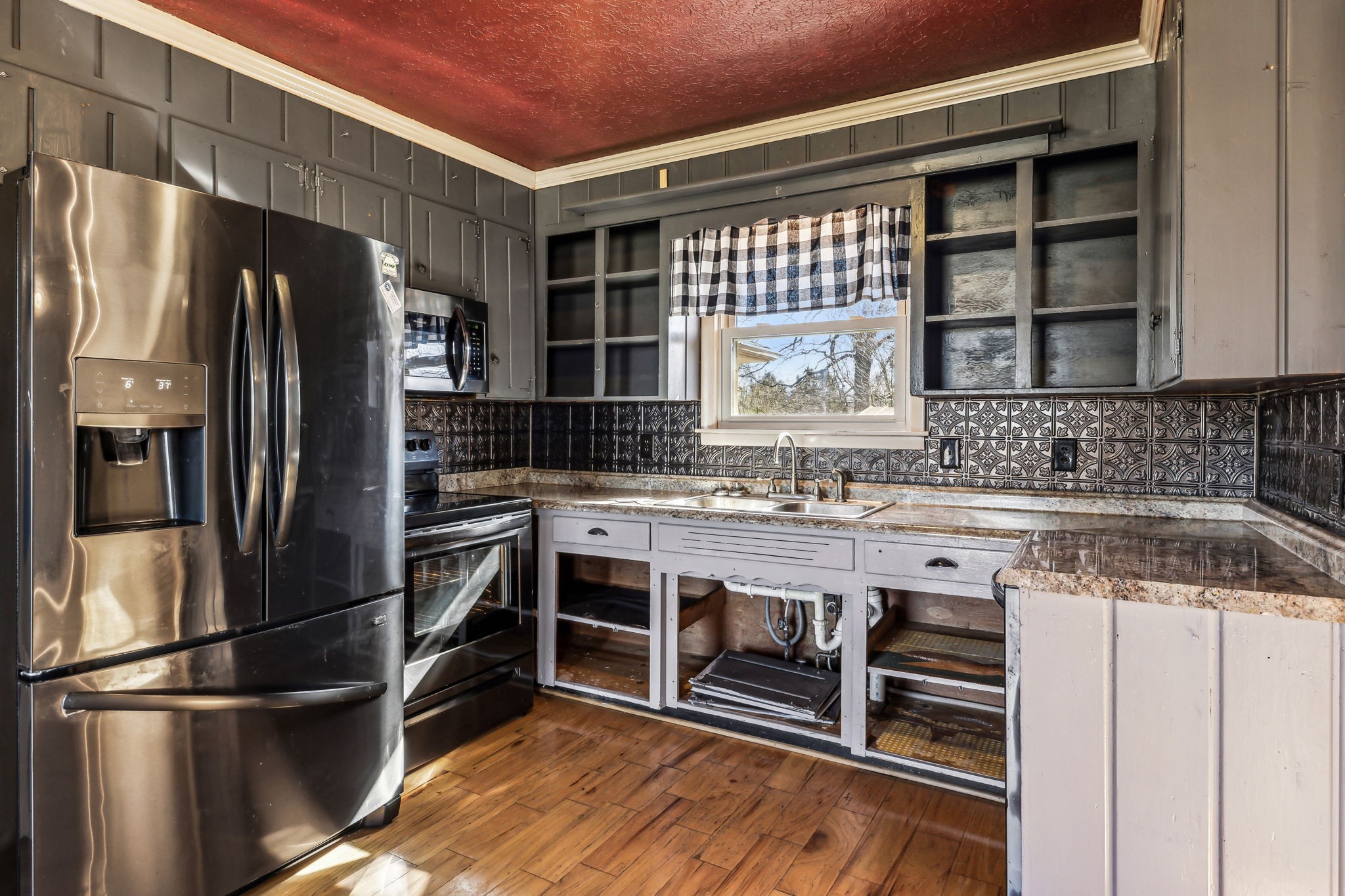 1170 Jim Read Road Ashland City, TN 37015 - Photo 12 of 39 a kitchen with stainless steel appliances a refrigerator and a sink