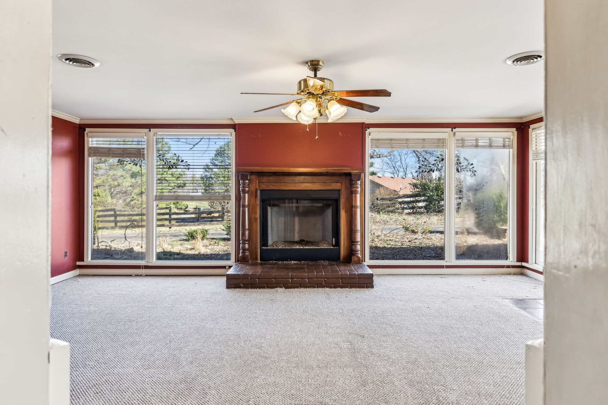 1170 Jim Read Road Ashland City, TN 37015 - Photo 22 of 39 a living room with fireplace furniture and a large window