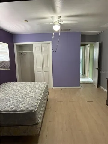 a view of a bathroom from a hallway