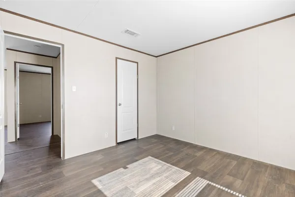 a bathroom with a granite countertop sink toilet a large mirror a bathtub and shower
