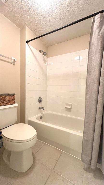 10000 Southwest 52nd Avenue, Unit 7 Gainesville, FL 32608 - Photo 14 of 24 a bathroom with a toilet and a shower