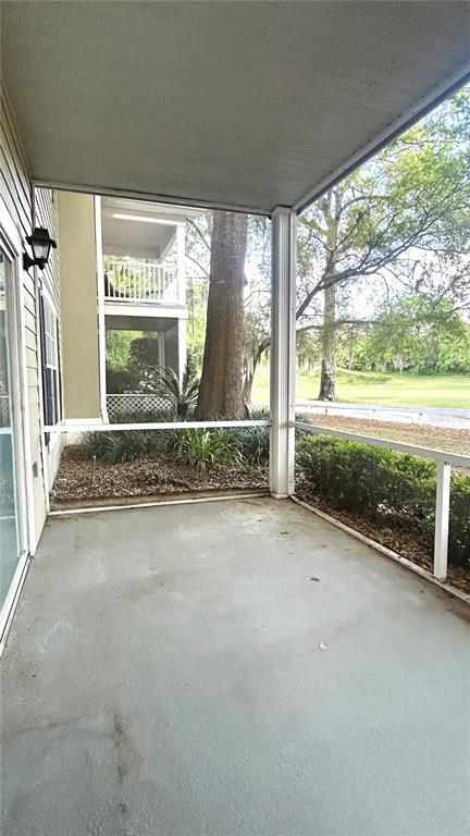 10000 Southwest 52nd Avenue, Unit 7 Gainesville, FL 32608 - Photo 24 of 24 an empty room with floor to ceiling windows and outdoor view