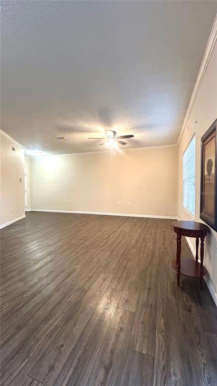 10000 Southwest 52nd Avenue, Unit 7 Gainesville, FL 32608 - Photo 7 of 24 a view of room with wooden floor