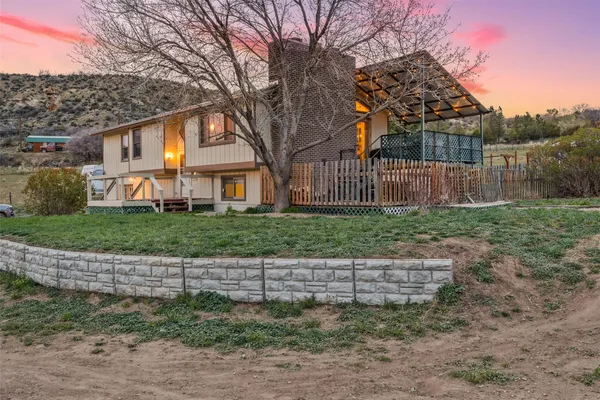 a view of a yard in front of a house