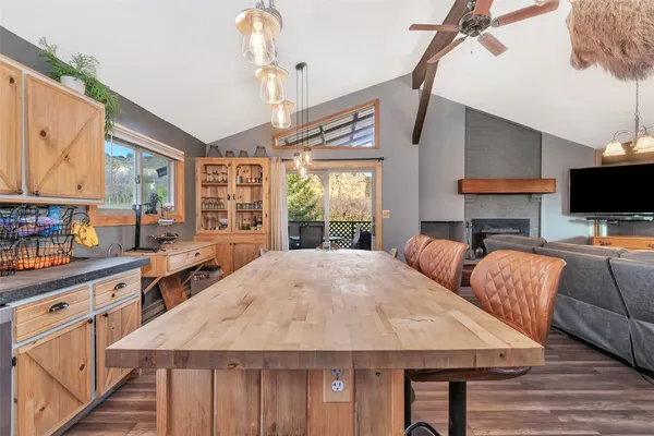 a view of kitchen with cabinets and wooden floor