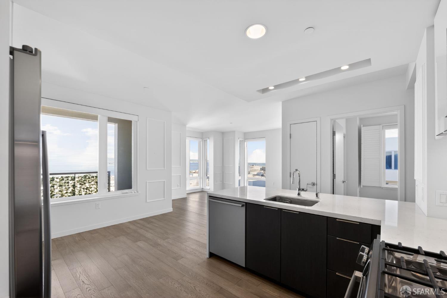 10 Innes Court, Unit 401 San Francisco, CA 94124 - Photo 13 of 33 a bathroom with a sink and a window