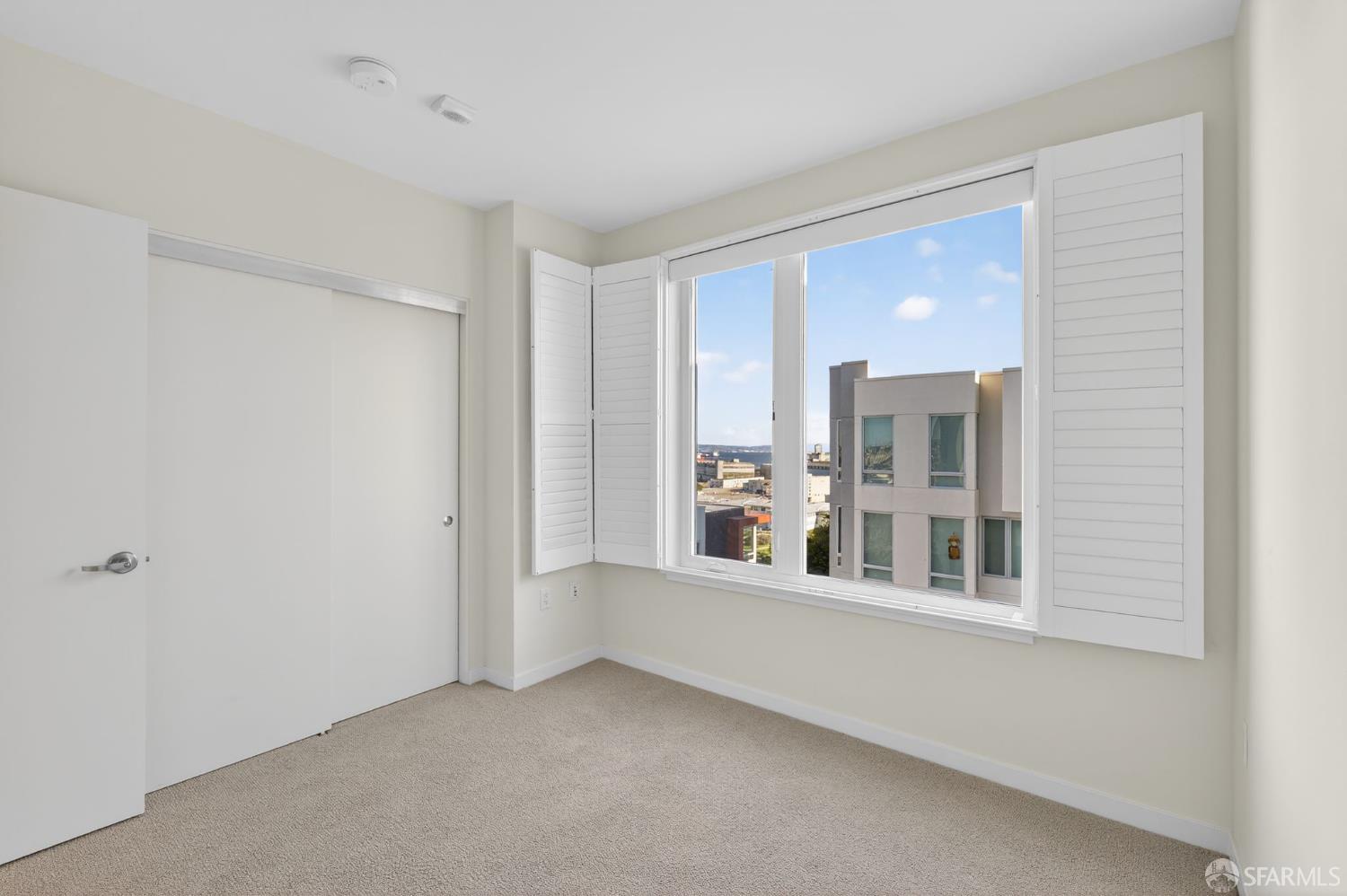 10 Innes Court, Unit 401 San Francisco, CA 94124 - Photo 27 of 33 a view of an empty room with a window