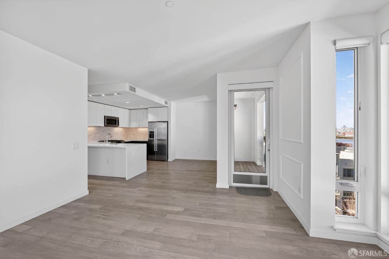 10 Innes Court, Unit 401 San Francisco, CA 94124 - Photo 7 of 33 a view of kitchen with wooden floor