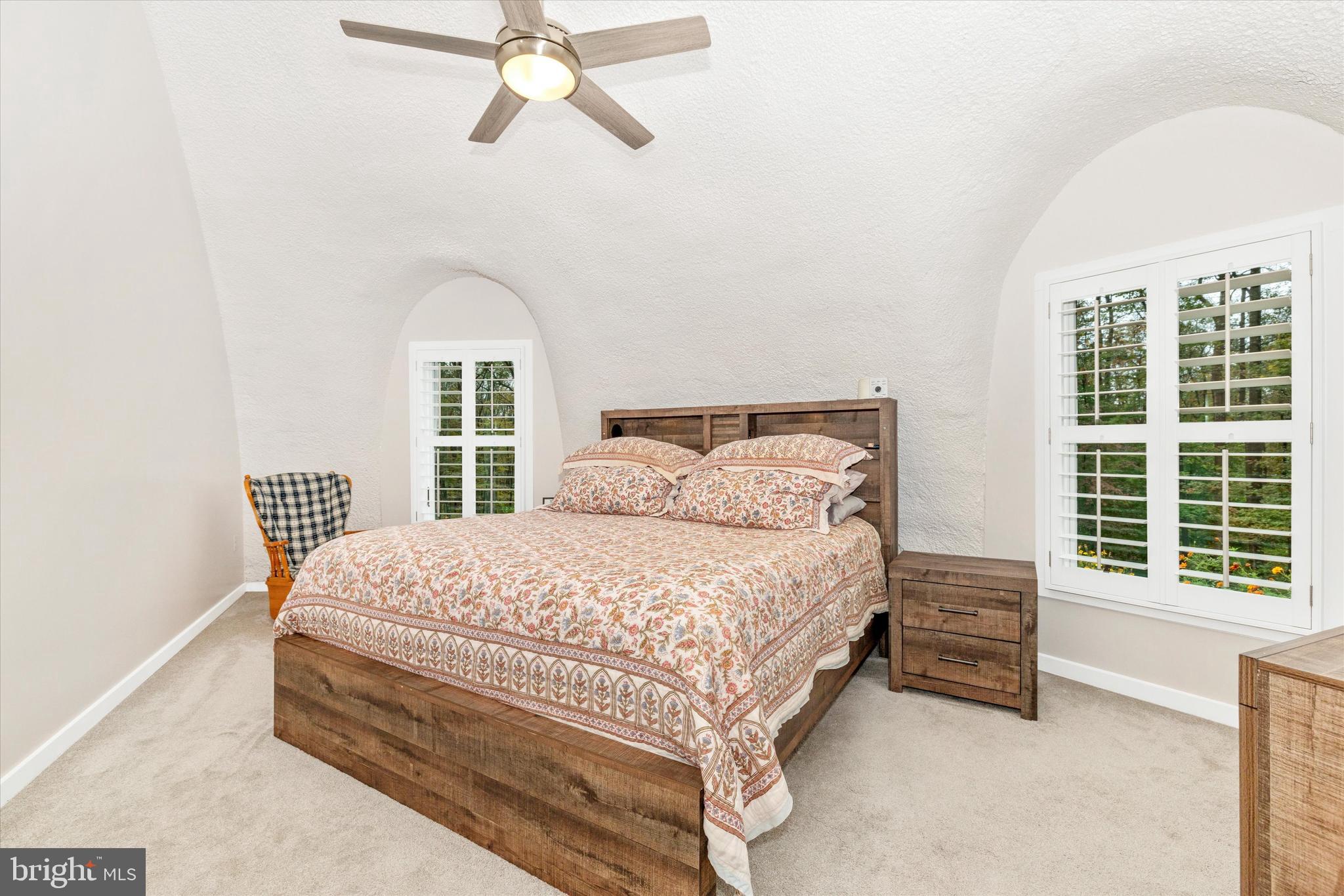 4940 Fox Tower Road Smithsburg, MD 21783 - Photo 18 of 41 a bedroom with a bed and a window