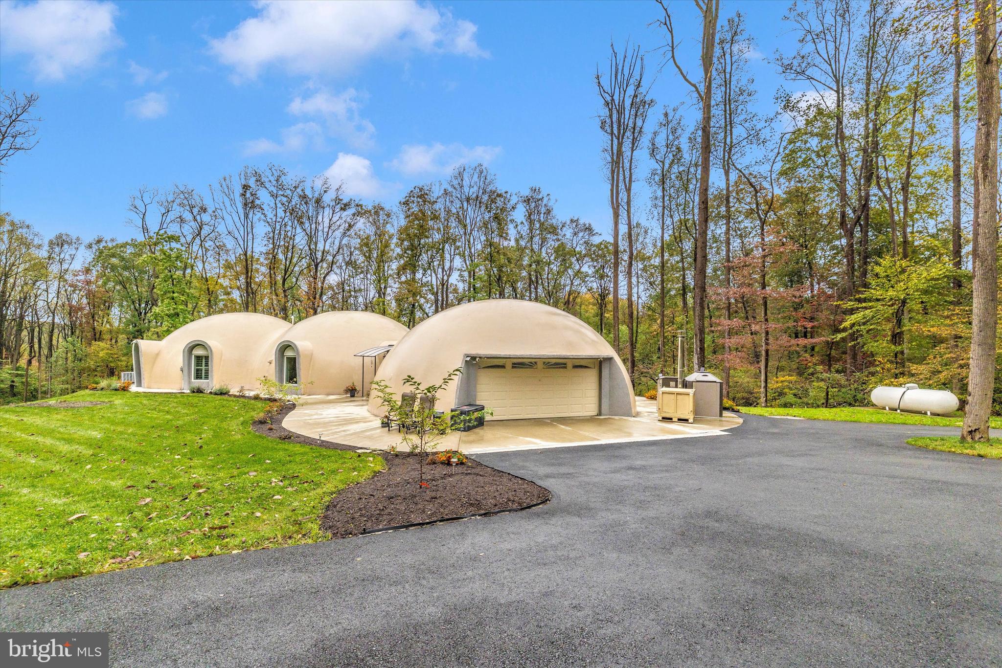 4940 Fox Tower Road Smithsburg, MD 21783 - Photo 33 of 41 a view of a table and chairs in the garden