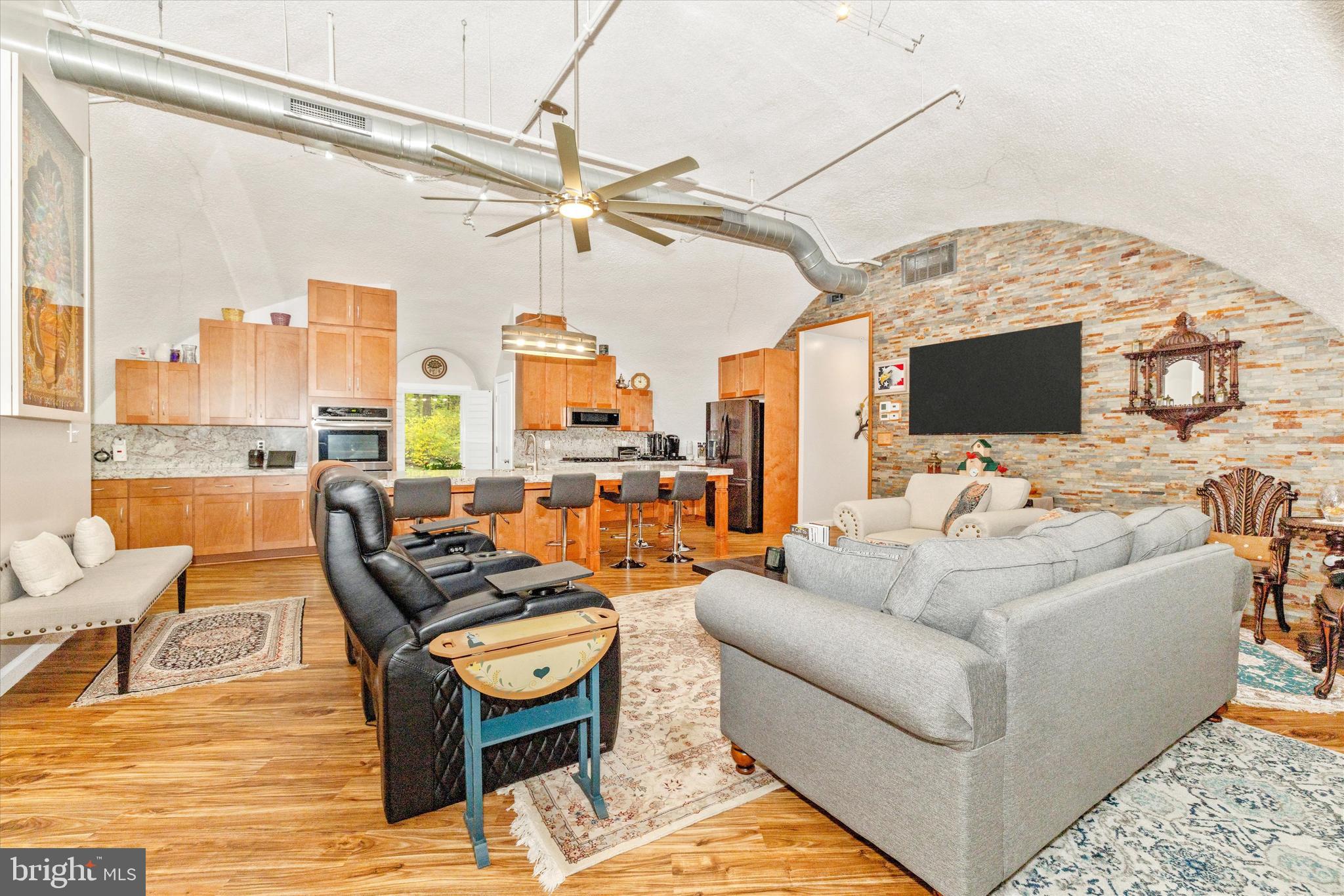 4940 Fox Tower Road Smithsburg, MD 21783 - Photo 10 of 41 a living room with furniture and a flat screen tv