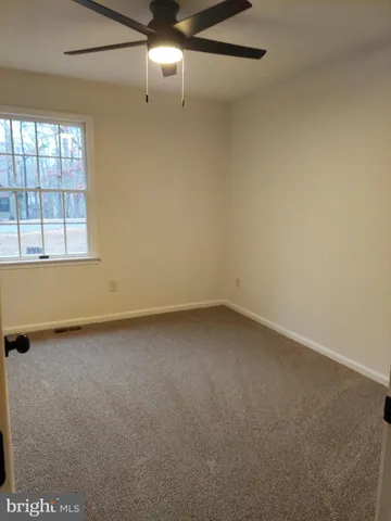 a bathroom with a sink toilet and vanity