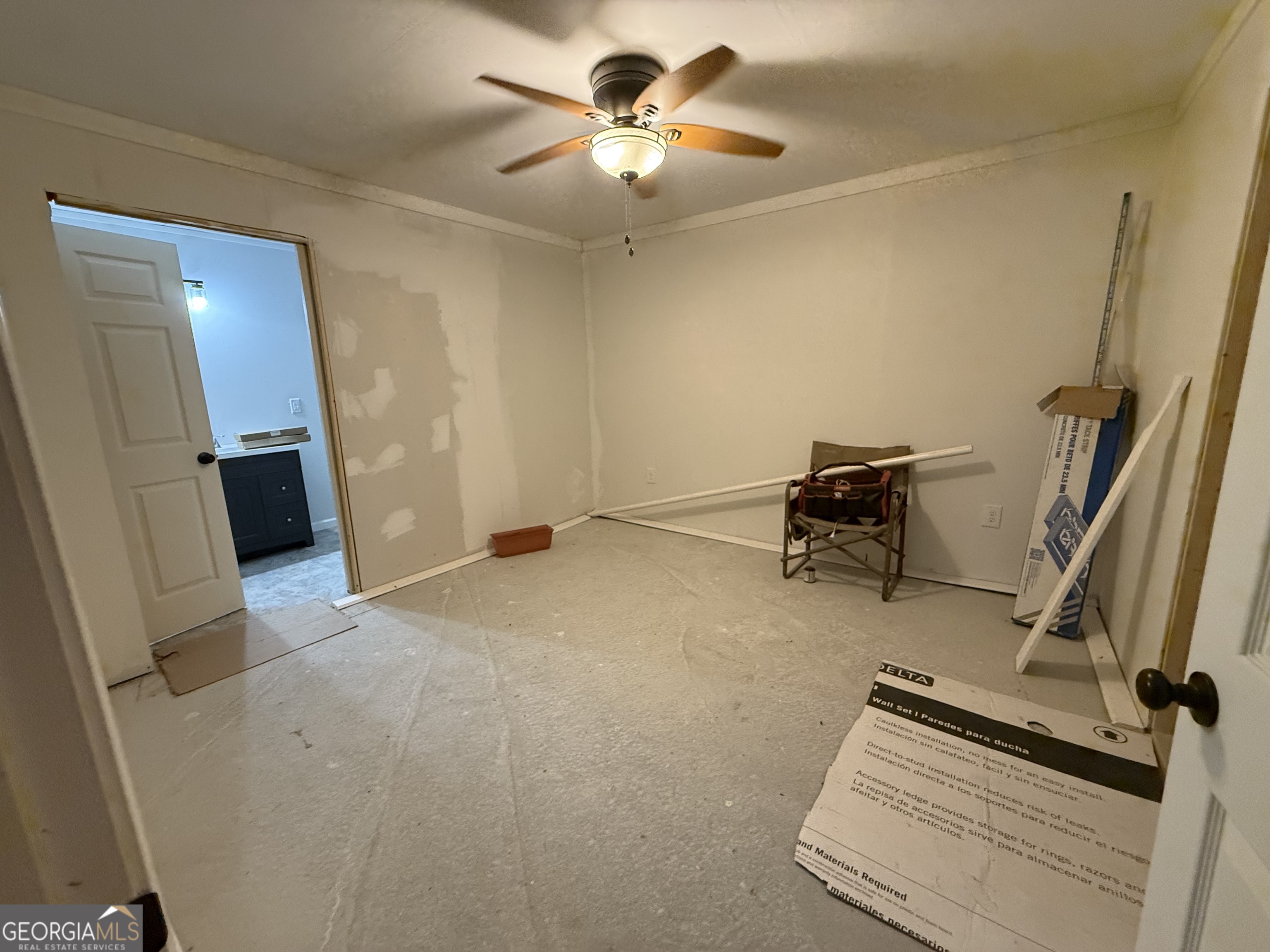 1550 Adabelle Road South Register, GA 30452 - Photo 12 of 20 a view of a workspace with furniture and a window