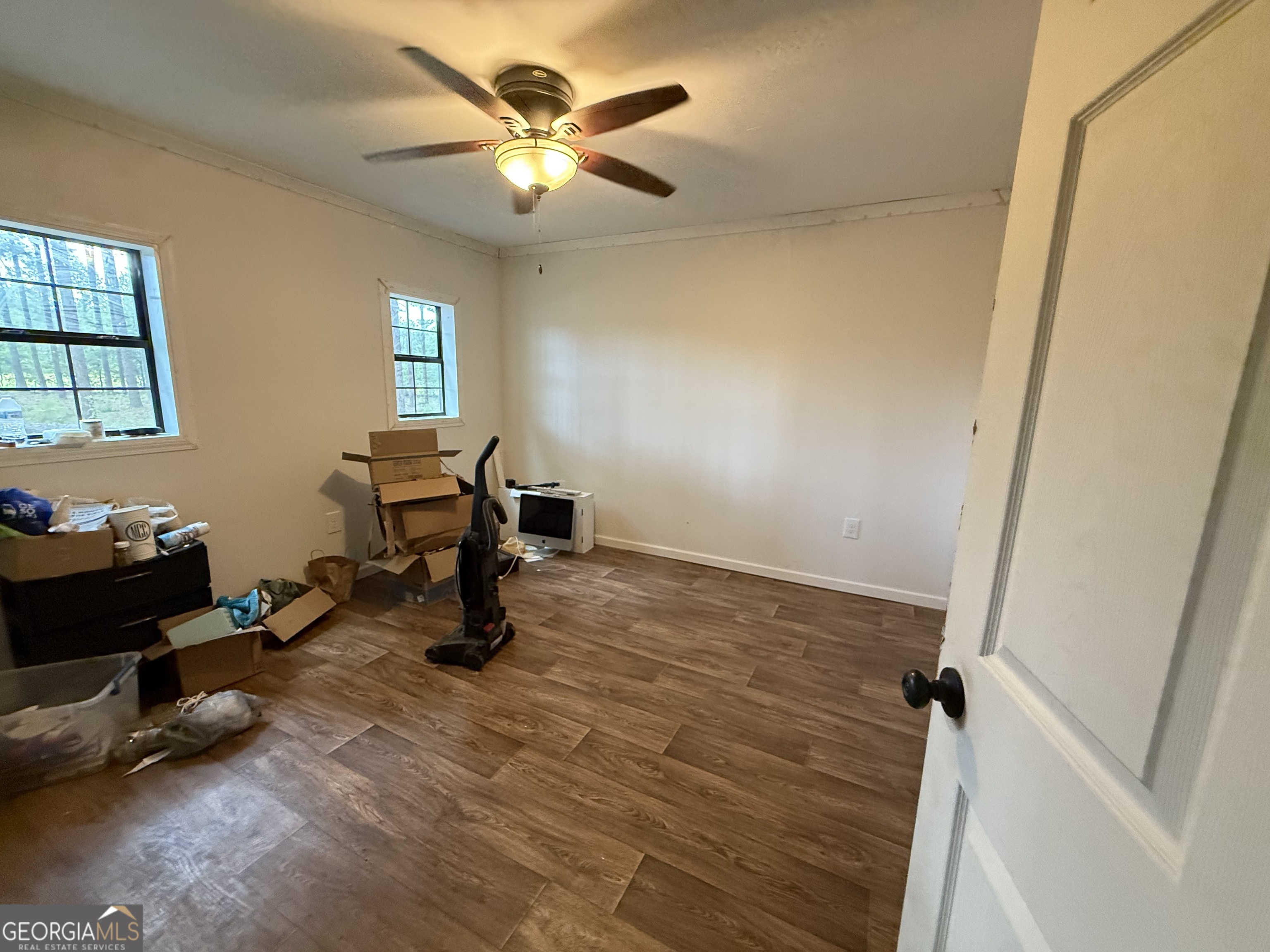1550 Adabelle Road South Register, GA 30452 - Photo 10 of 20 a view of a workspace with furniture and a window