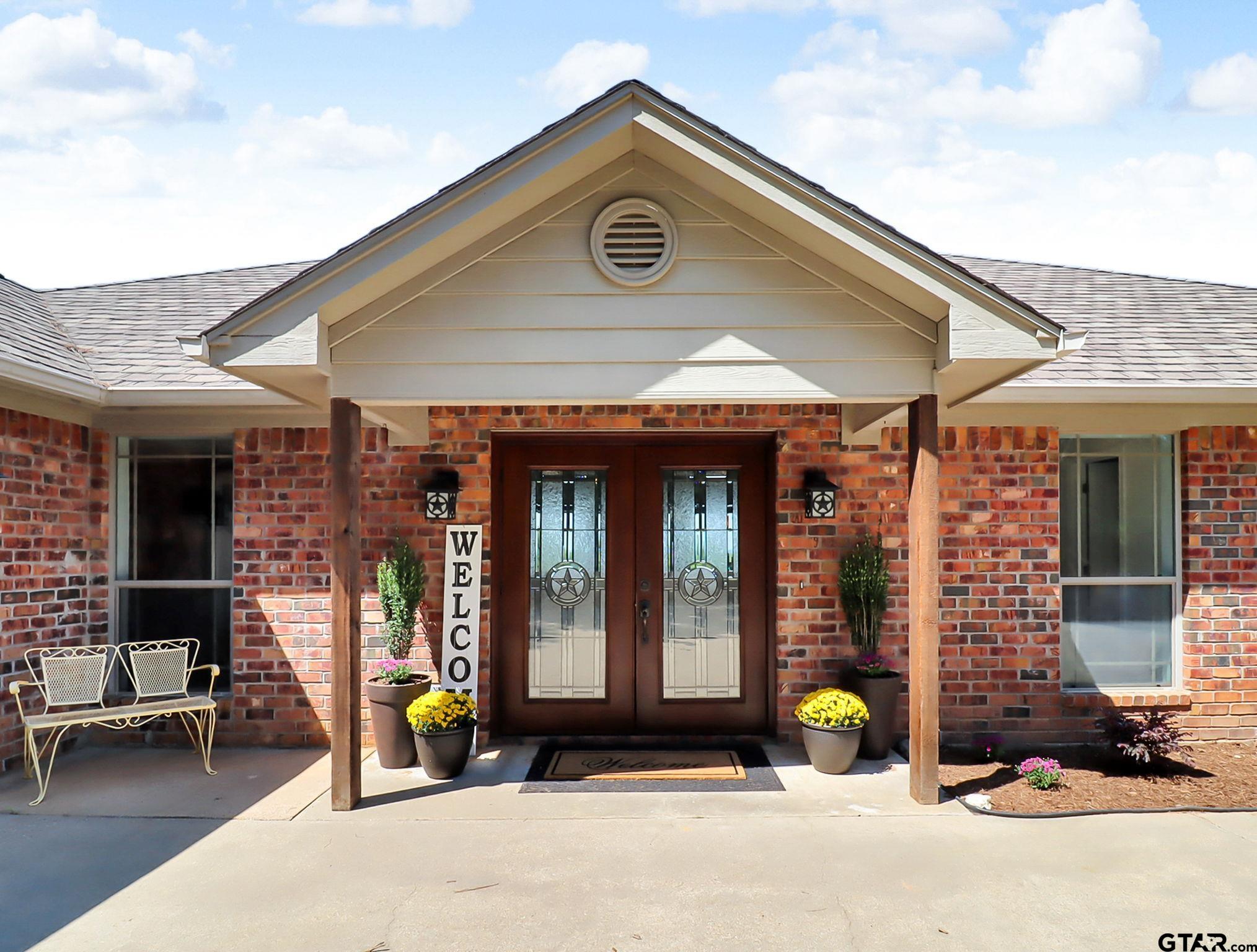 307 Roesch Road Hallsville, TX 75650 - Photo 37 of 40 a view of a car park in front of building