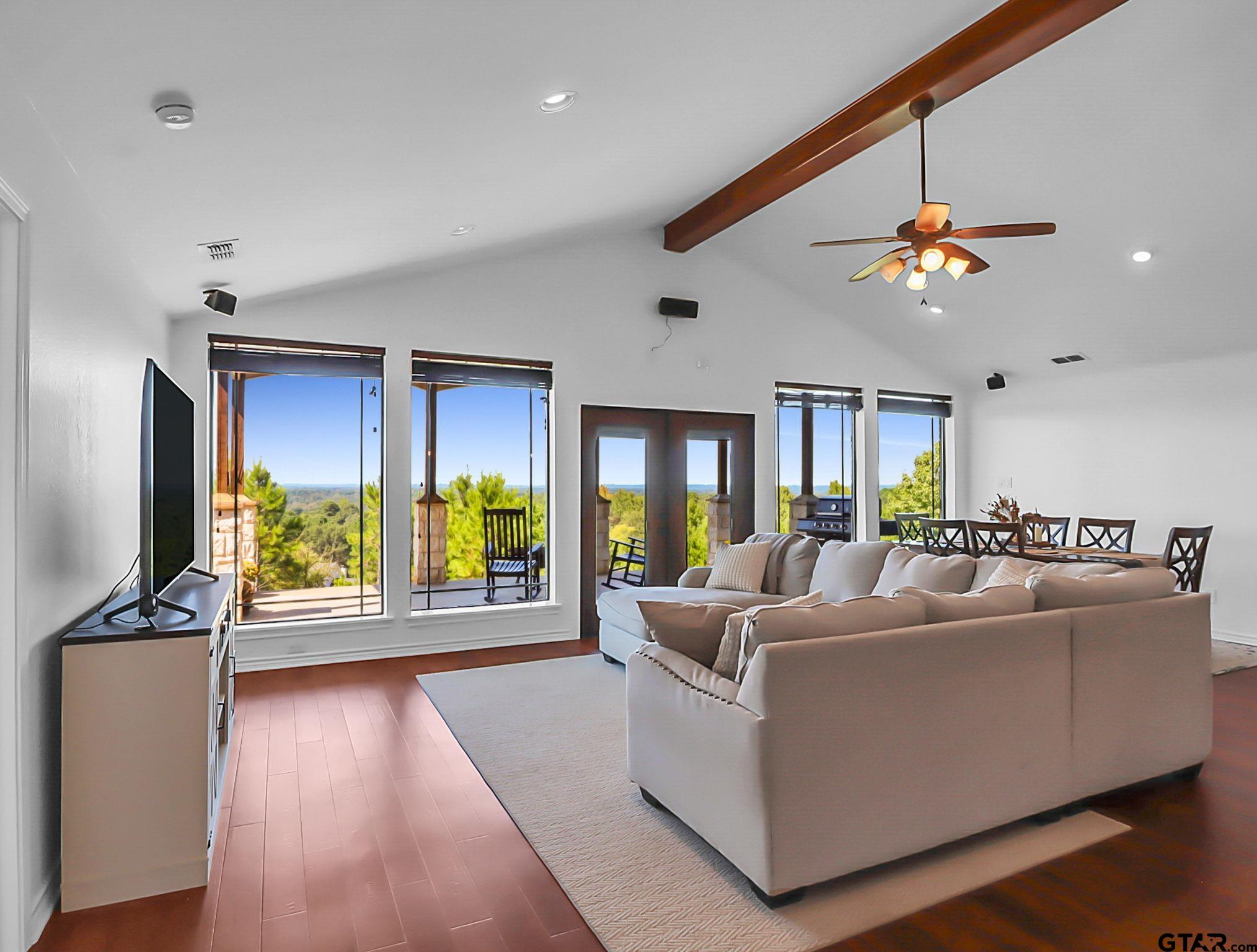 307 Roesch Road Hallsville, TX 75650 - Photo 6 of 40 a living room with furniture and a flat screen tv