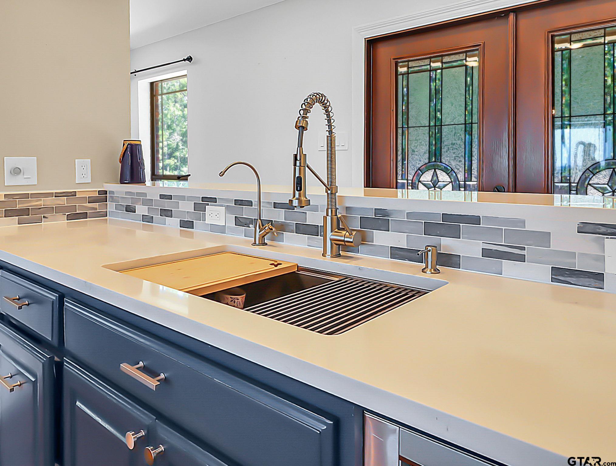 307 Roesch Road Hallsville, TX 75650 - Photo 7 of 40 a kitchen with a sink and a window