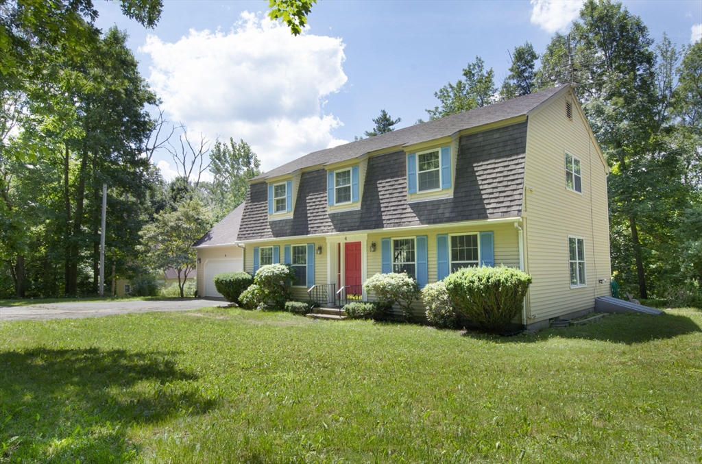 4 Walker Pond Road Sturbridge, MA 01566 - Photo 3 of 41 a view of a house with a yard and potted plants