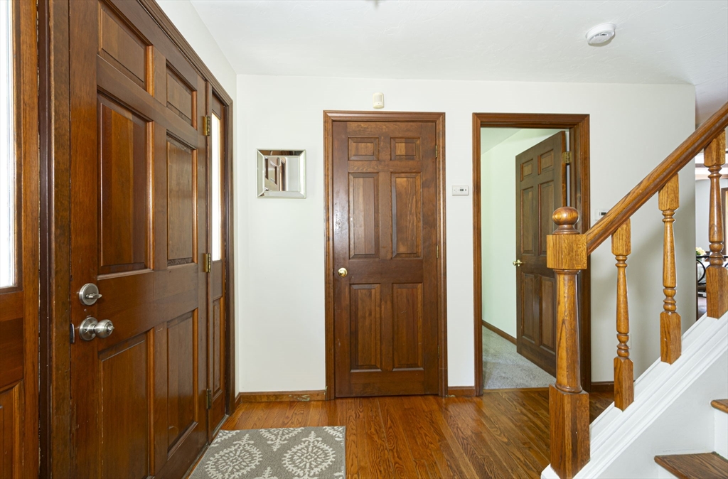 4 Walker Pond Road Sturbridge, MA 01566 - Photo 8 of 41 a view of front door with hallway