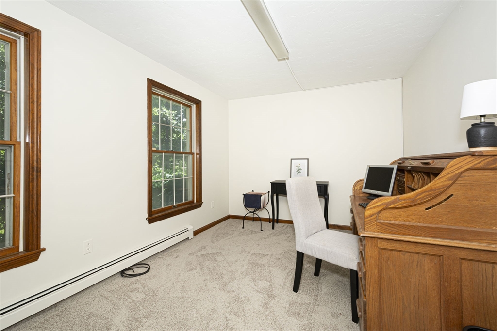 4 Walker Pond Road Sturbridge, MA 01566 - Photo 9 of 41 a living room with furniture and a window
