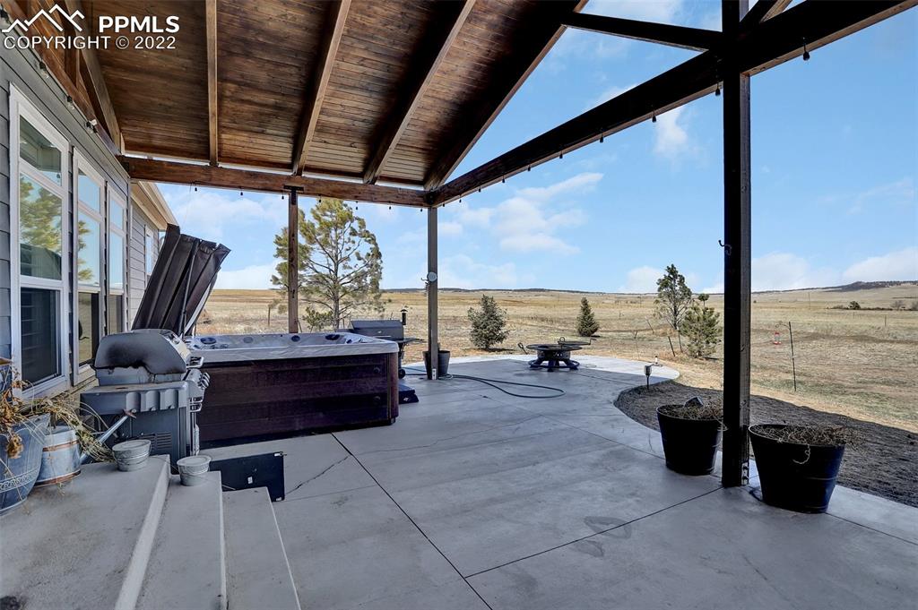 24335 Sweet Road Calhan, CO 80808 - Photo 29 of 39 a building outdoor space with patio furniture and ocean view