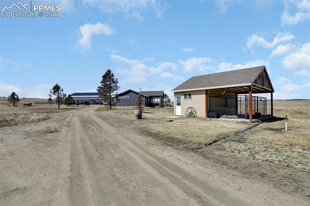 24335 Sweet Road Calhan, CO 80808 - Photo 3 of 39 a view of a house with a outdoor space