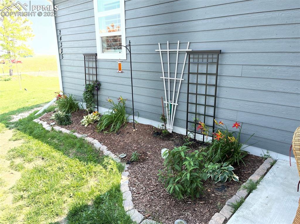 24335 Sweet Road Calhan, CO 80808 - Photo 35 of 39 a view of a backyard