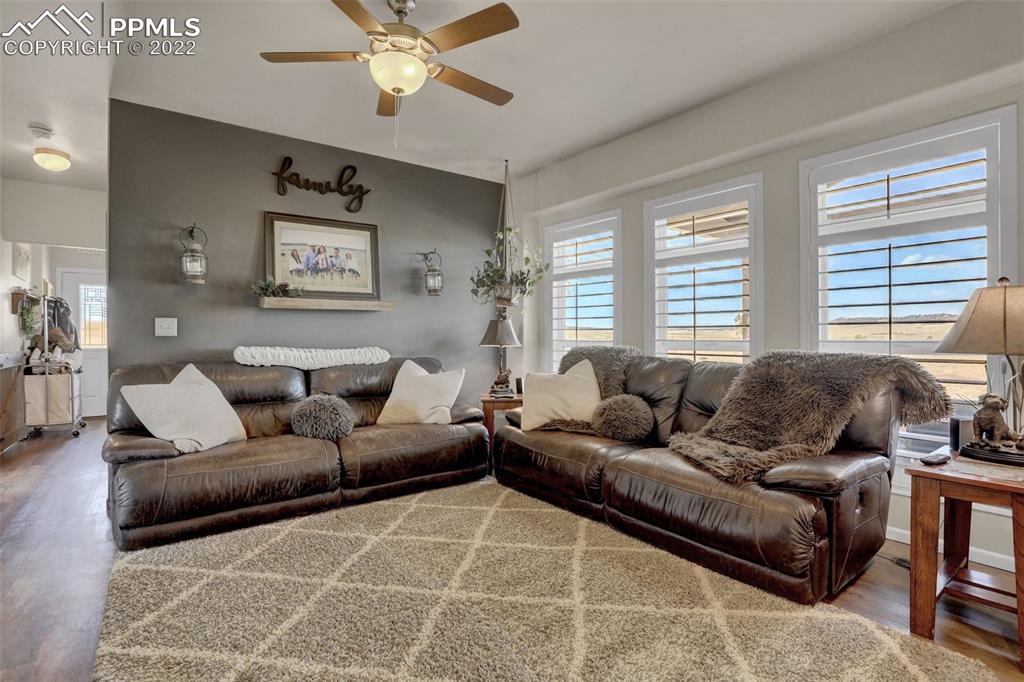 24335 Sweet Road Calhan, CO 80808 - Photo 6 of 39 a living room with furniture and a window