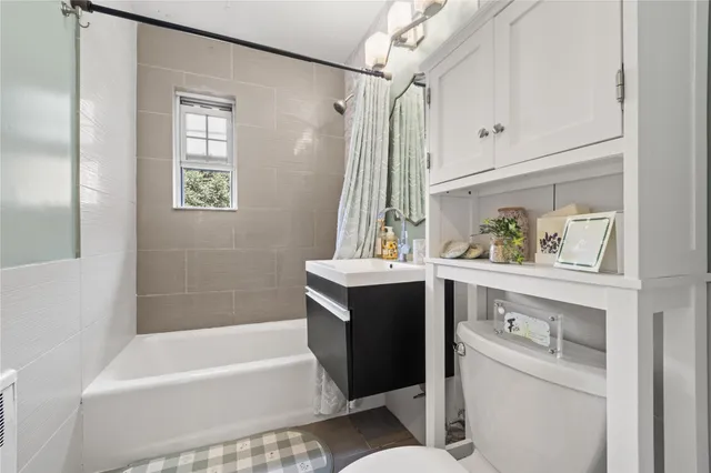 a bathroom with a sink and a bathtub