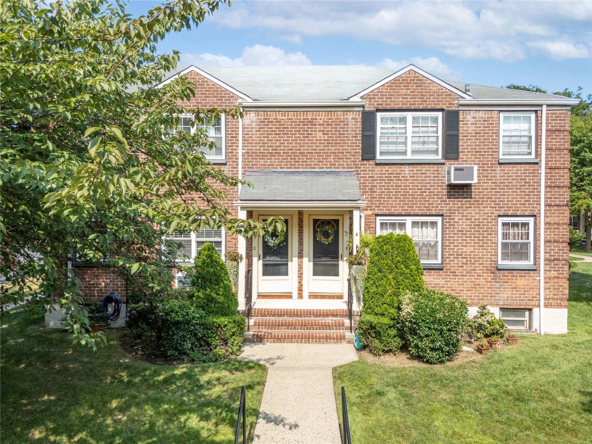 69-09 215th Street, Unit LOWER 1 Queens, NY 11364 - Photo 17 of 20 front view of a house