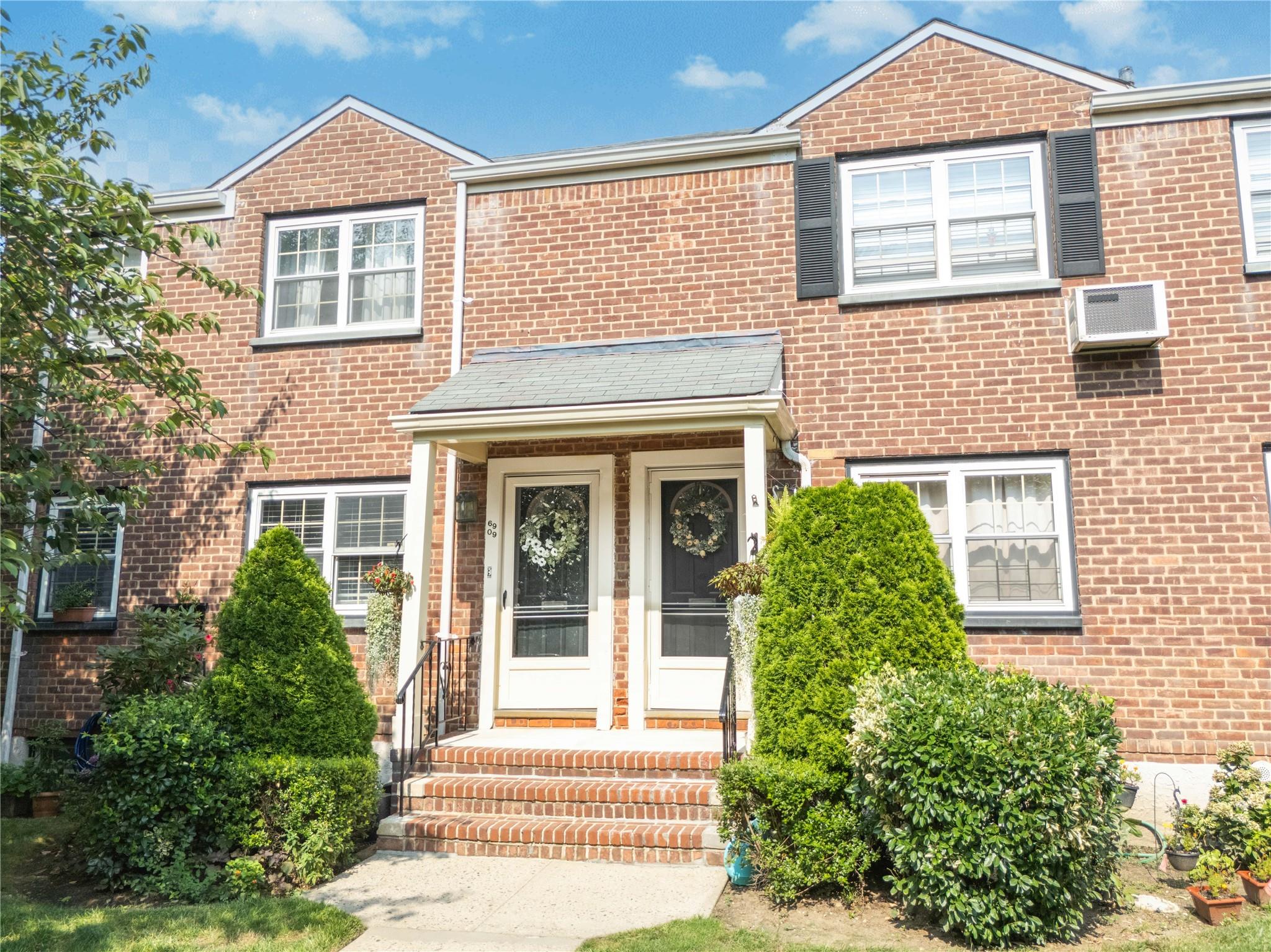 69-09 215th Street, Unit LOWER 1 Queens, NY 11364 - Photo 18 of 20 front view of a house