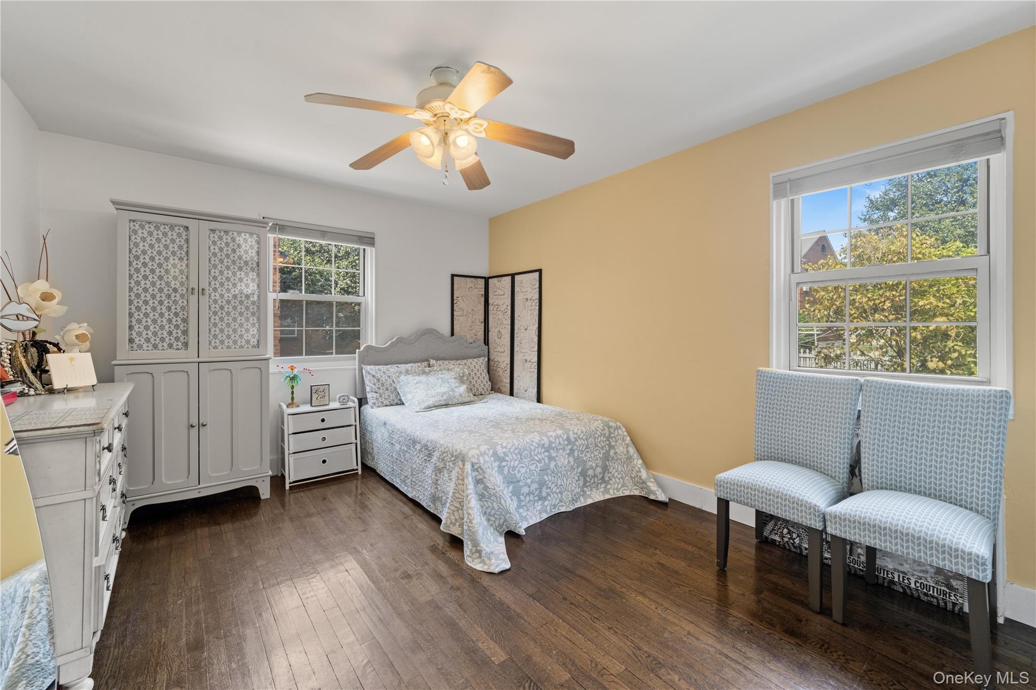 69-09 215th Street, Unit LOWER 1 Queens, NY 11364 - Photo 5 of 20 Bedroom featuring dark wood finished floors and a ceiling fan